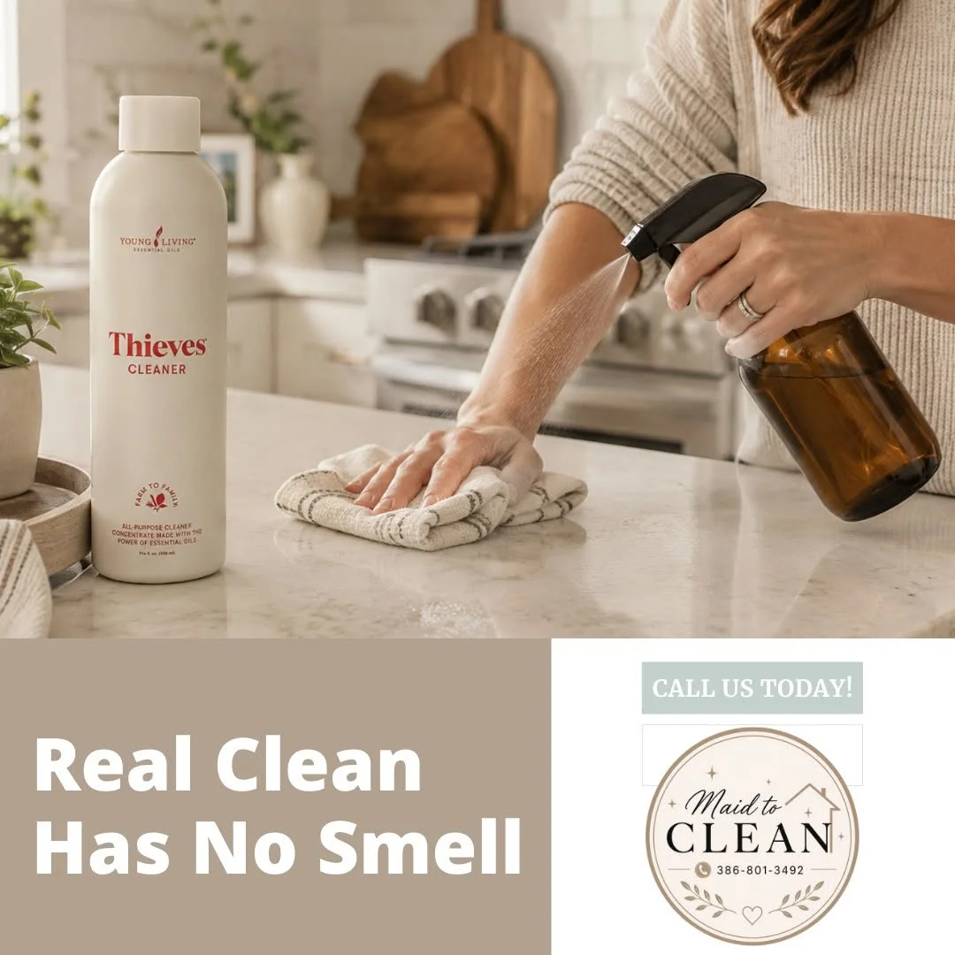 Wiping down kitchen counter with Thieves spray cleaner